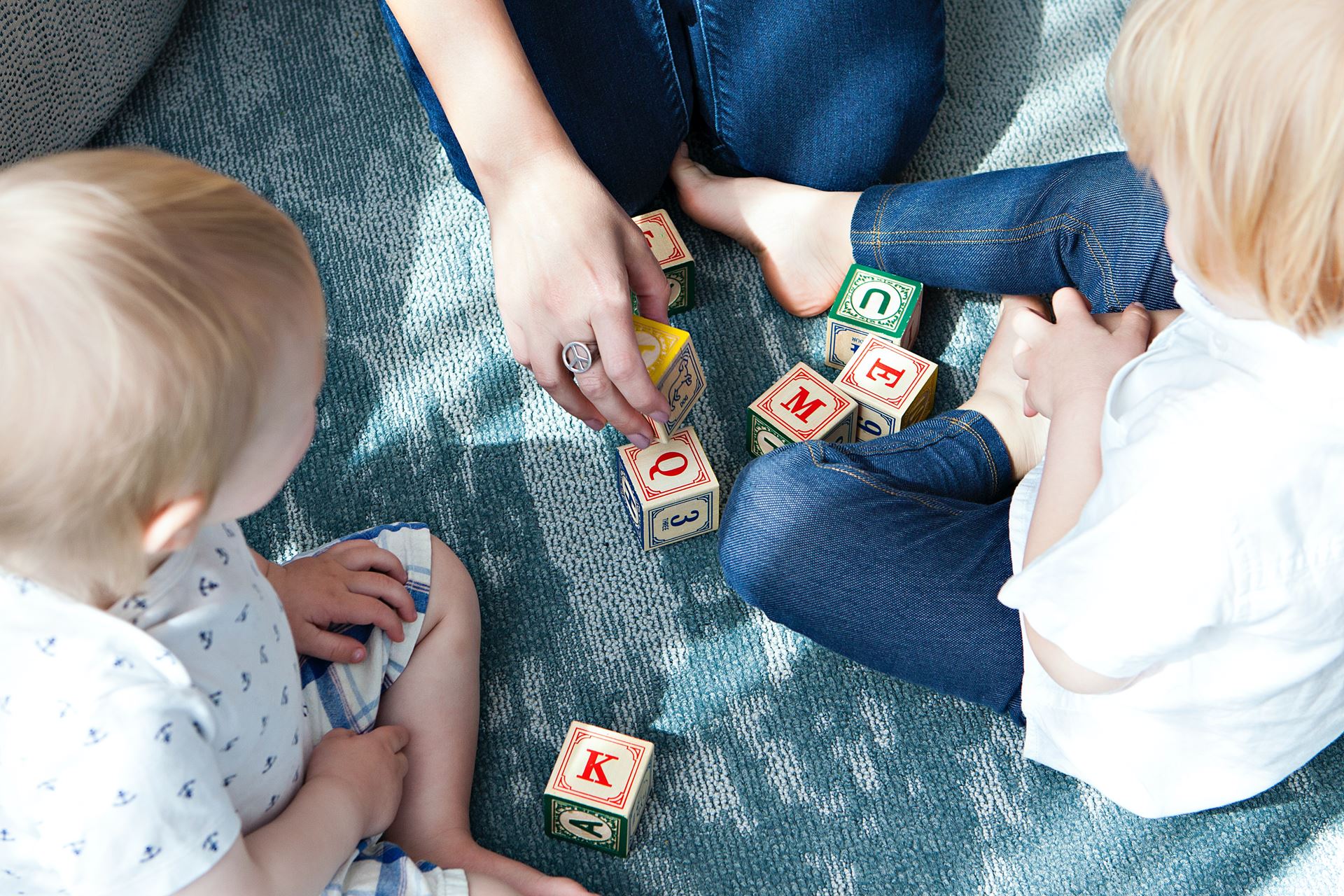 a child playing with building blocks